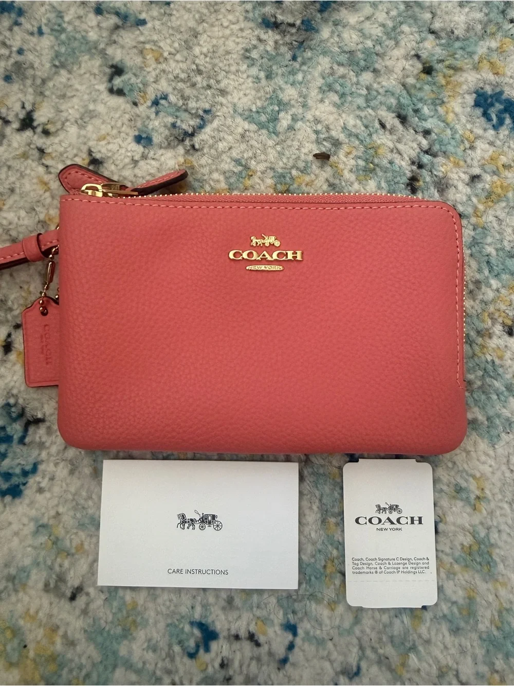 COACH Pebbled Leather Wristlet in Rose Pink with Gold Logo